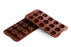 <img src="https://cdn.shopify.com/s/files/1/0084/6109/0875/products/SCG19_3.jpg?v=1571503790" alt="Silikomart SCG19 Fantasia chocolate mold, (H 0.59" )">